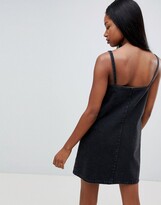 Thumbnail for your product : ASOS DESIGN DESIGN denim button through slip dress in black with tortoiseshell buttons
