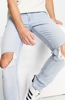 Thumbnail for your product : Topman Blowout Ripped Skinny Fit Jeans
