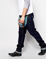 Thumbnail for your product : Vivienne Westwood Africa Jeans Limited Edition ASOS Exclusive Low Crotch Slim Tapered 3D Rinse