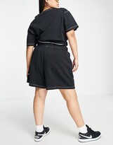 Thumbnail for your product : Nike Swoosh Plus contrast stitch fleece shorts in black