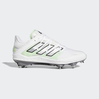white metal baseball cleats