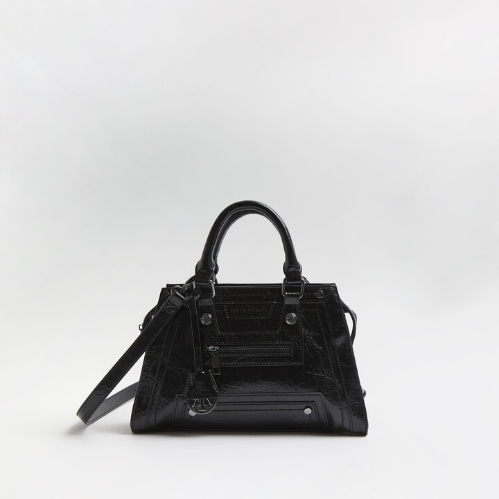 black leather handbolsas river island
