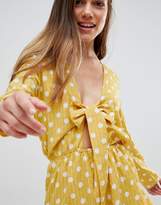 Thumbnail for your product : Glamorous Petite Playsuit With Frill Shorts And Bow Front In Polka Dot