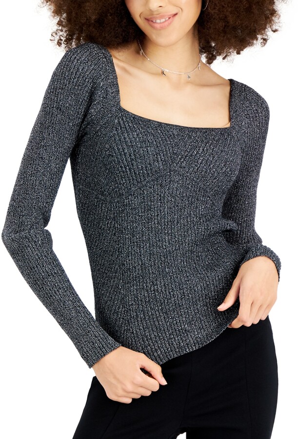 black sweater with bow on shoulder