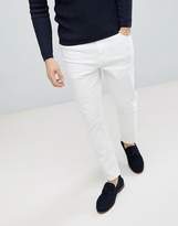 Thumbnail for your product : ASOS Design DESIGN Tapered jeans in white