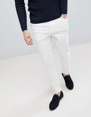 ASOS Design DESIGN Tapered jeans in white