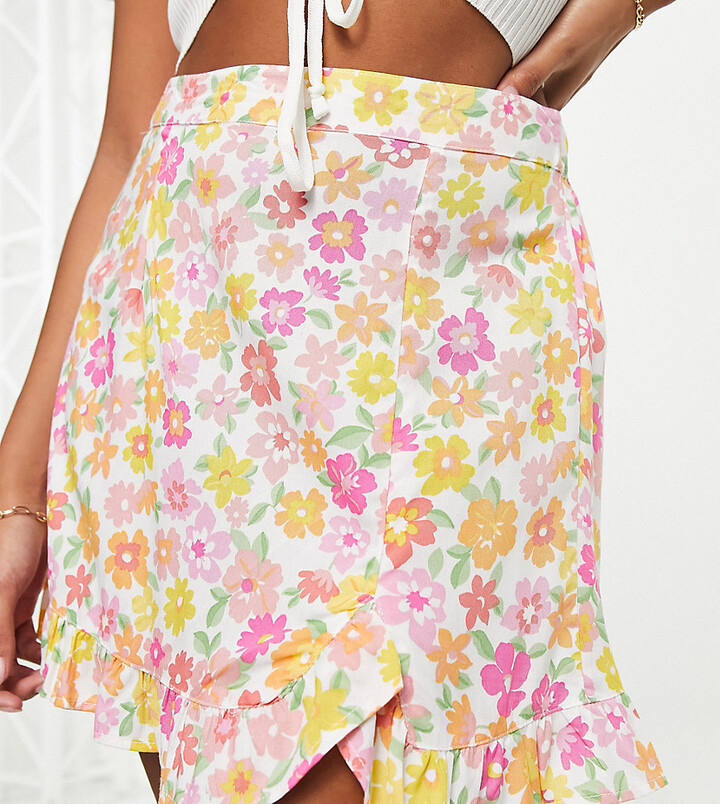 ASOS DESIGN micro swim skirt with frill hem in pink abstract smudge print