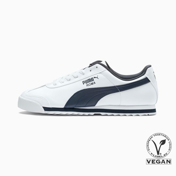 white and navy blue pumas