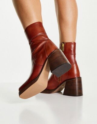 ASOS DESIGN Region leather mid heel boots in tan - ShopStyle