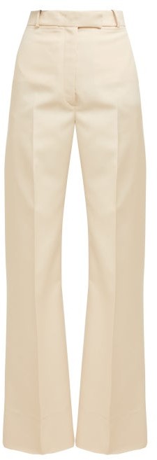 cream flared trousers