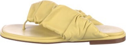 Hereu Leather Slides Yellow Pleated Accents Includes Dust Bag Unfortunately due to restrictions this item may not be eligible for shipping in all areas.