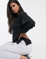 Thumbnail for your product : ASOS DESIGN DESIGN oversized long sleeve t-shirt with cuff detail in black