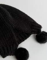 Thumbnail for your product : Urban Code UrbancodeTriple Pom Beanie in Black