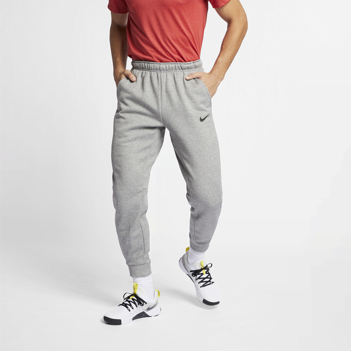 Nike Men's ThermaFIT Tapered Training Pants in Grey ShopStyle