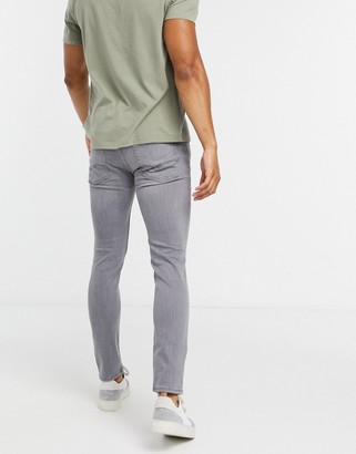 Jack and Jones Intelligence Liam skinny fit ripped jeans in light grey