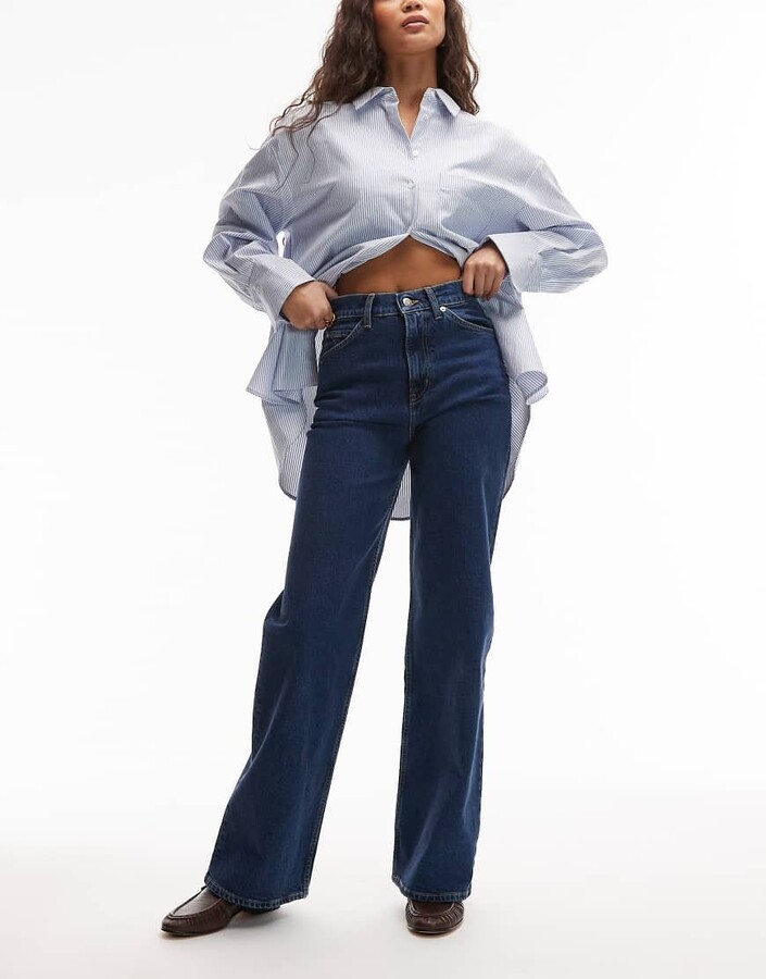 Arket Lupine high rise wide leg jeans in mid wash blue