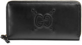 Gucci - EmBOSSed GG zip around wallet 