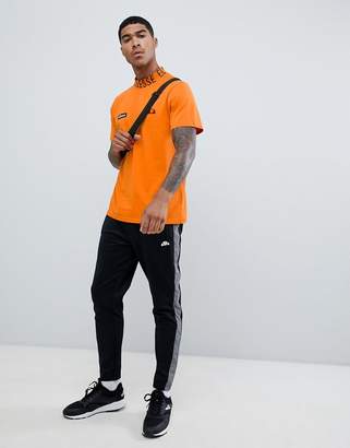 Ellesse T-Shirt With Repeat Logo Neckline In Orange