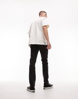 Thumbnail for your product : Topman skinny jeans in washed black