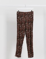 Thumbnail for your product : ASOS DESIGN jersey peg pants in animal print