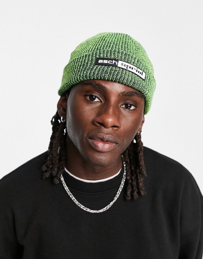 ASOS DESIGN ribbed beanie in neon and black twist with rubber patch - ShopStyle Hats