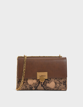 Charles & Keith Snake Print Chain Strap Clutch