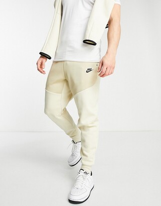 Nike Tech Fleece sweatpants in sand - ShopStyle Activewear Pants
