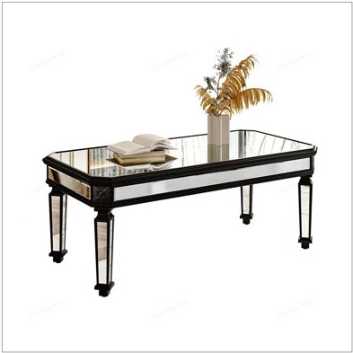 Stylish Mirrored Coffee Table with Vintage Carved Wooden Elements, Ideal for Enhancing Living Room and Office Decor.