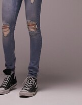 Thumbnail for your product : Topman heavy rip spray on jeans in mid wash tint