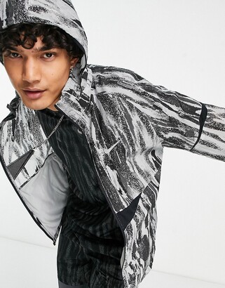 Nike Running Wild Run printed windrunner jacket in gray - ShopStyle