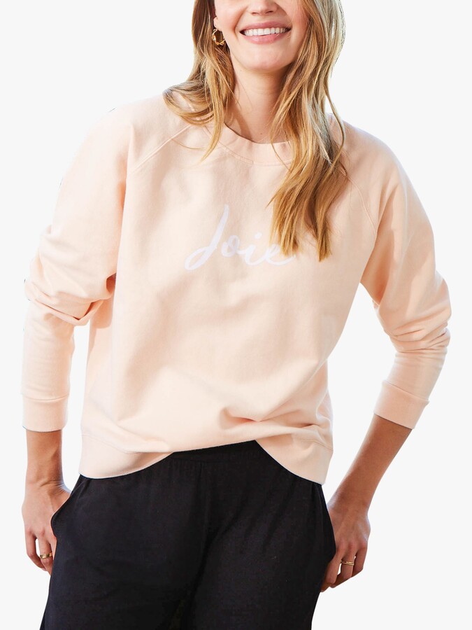 peach sweatshirt