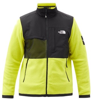 yellow and black north face coat