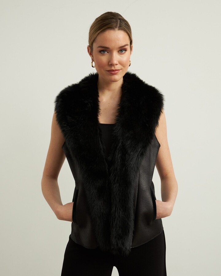 black faux fur vest