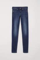 MID-RISE SLIMMING STRETCH JEGGINGS in Dark Wash