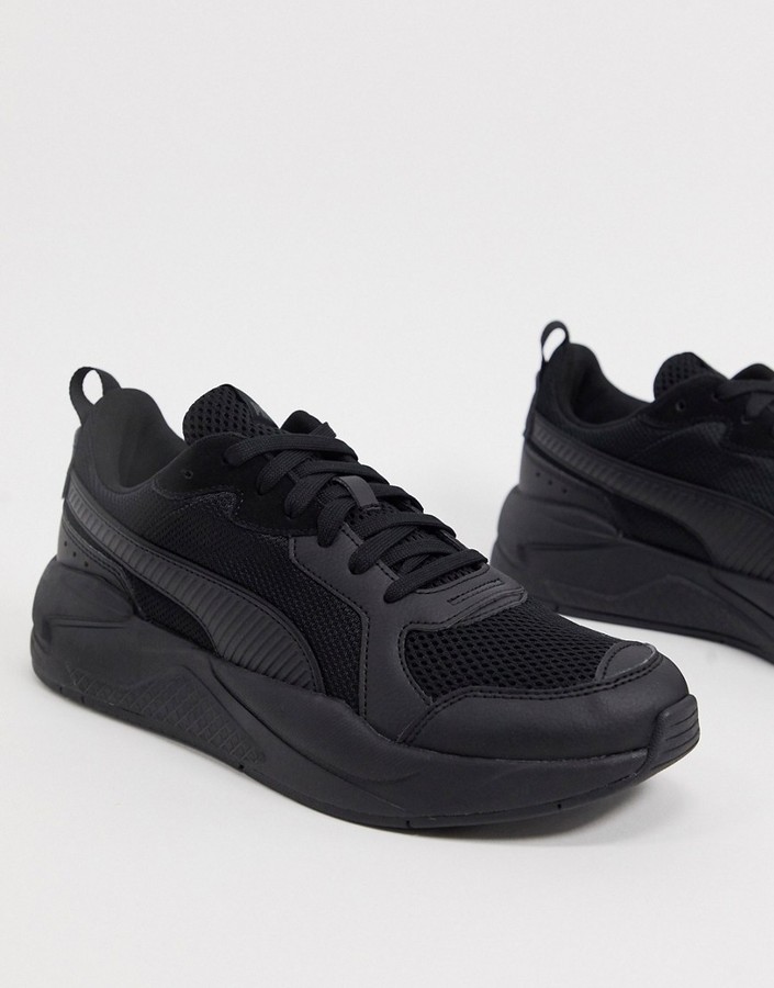 black puma trainers