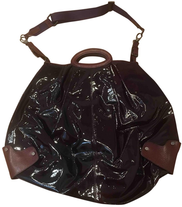 burgundy patent leather handbag