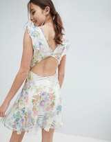 Thumbnail for your product : ASOS DESIGN ruffle sleeve mini dress in floral print with open back