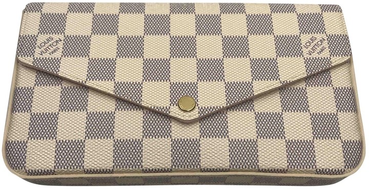 Get the Louis Vuitton FÃ©licie cloth clutch bag from Vestiaire Collective  now | AccuWeather Shop