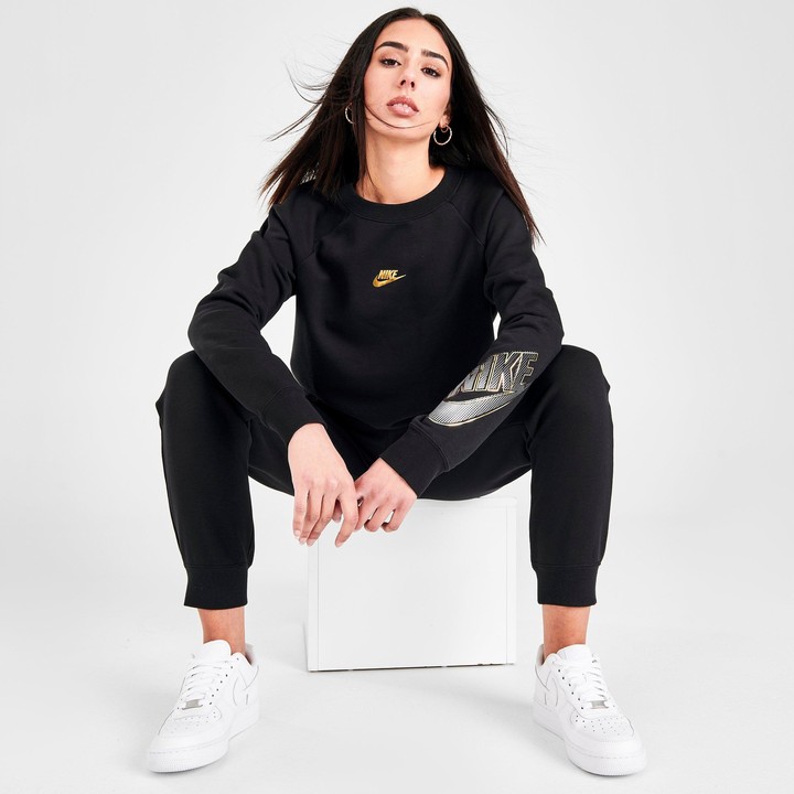 womens black and gold nike outfit