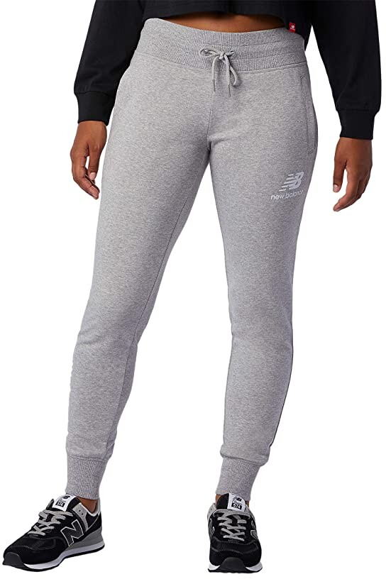 New Balance wide leg sweatpants in black - ShopStyle Activewear Pants