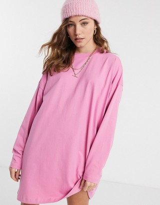 ASOS DESIGN oversized long sleeve t-shirt dress in pink with yellow face graphic