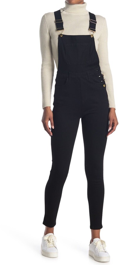 black overall skinny jeans