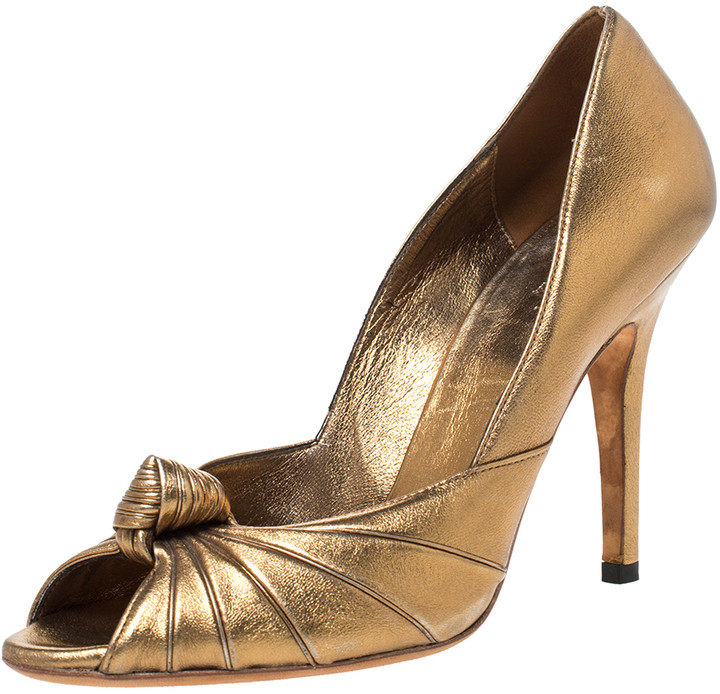 gold peep toe pumps