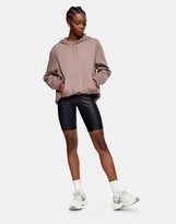 Thumbnail for your product : Topshop wet look legging shorts in black