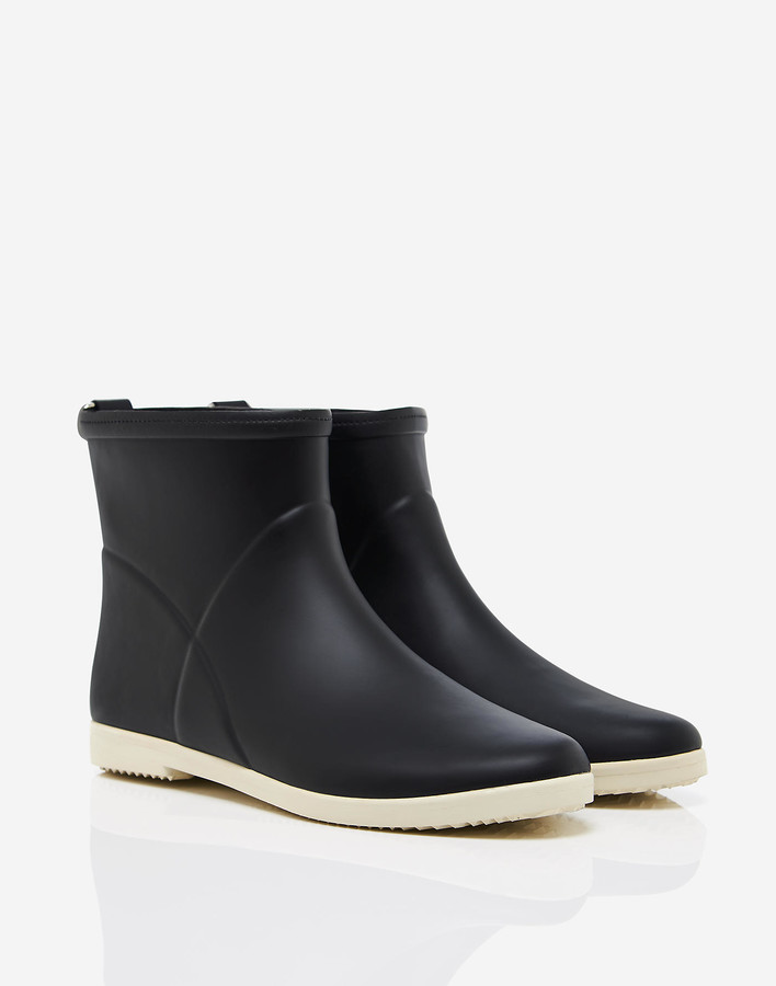 black and white rain boots