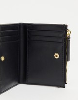 Thumbnail for your product : Monki Britta faux-leather zip-through wallet in black
