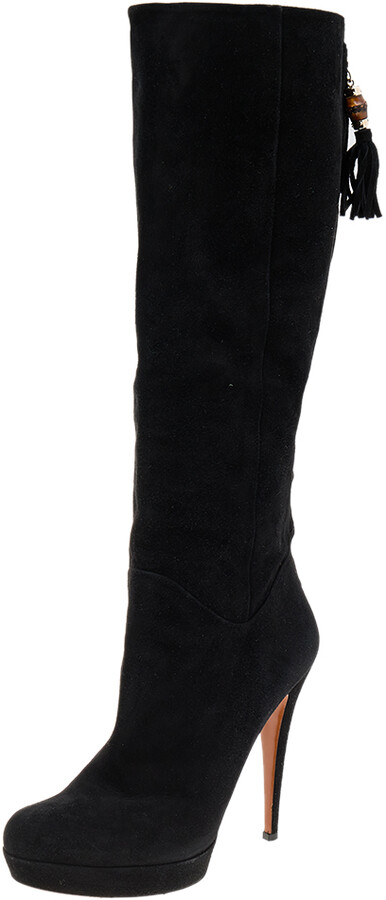 black tassle boots