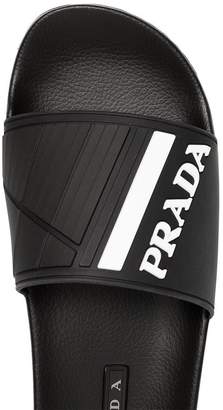 Prada black and white logo embossed pool slides