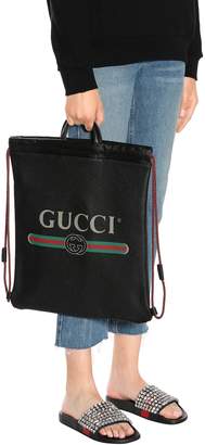 Gucci Printed leather drawstring backpack