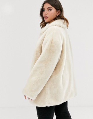 ASOS DESIGN Curve faux fur button through coat in cream